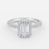 emerald floating halo engagement rings