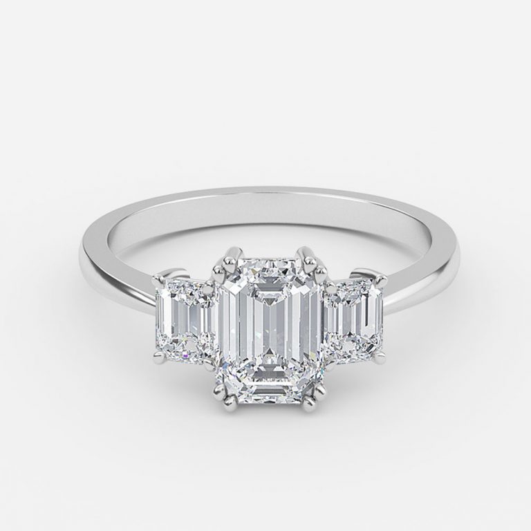 three stone emerald cut diamond ring platinum