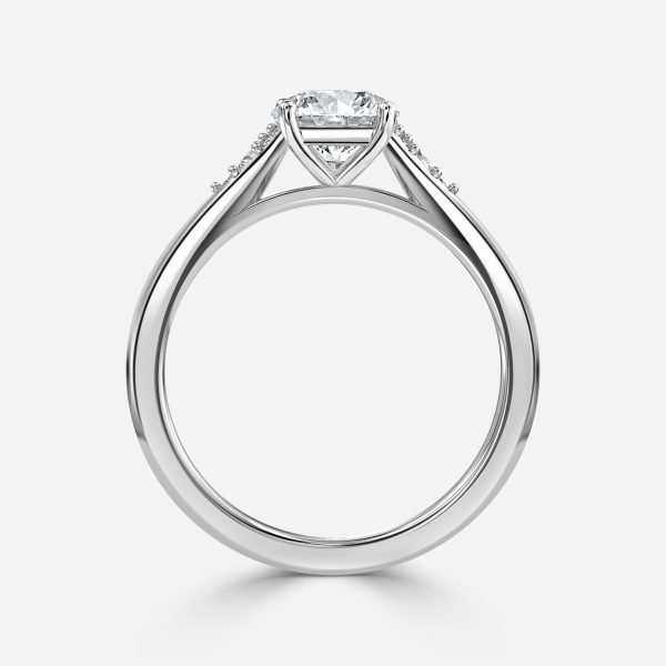platinum round shaped diamond three stone wedding ring